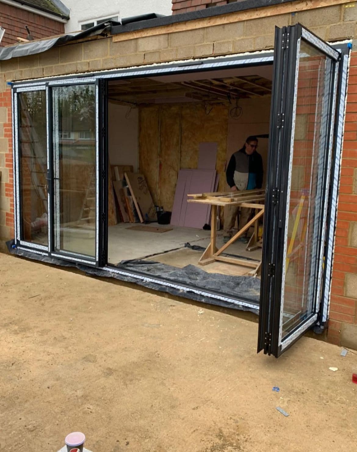 Aluminium bifold door installation in residential flat, SW18 Wandsworth London