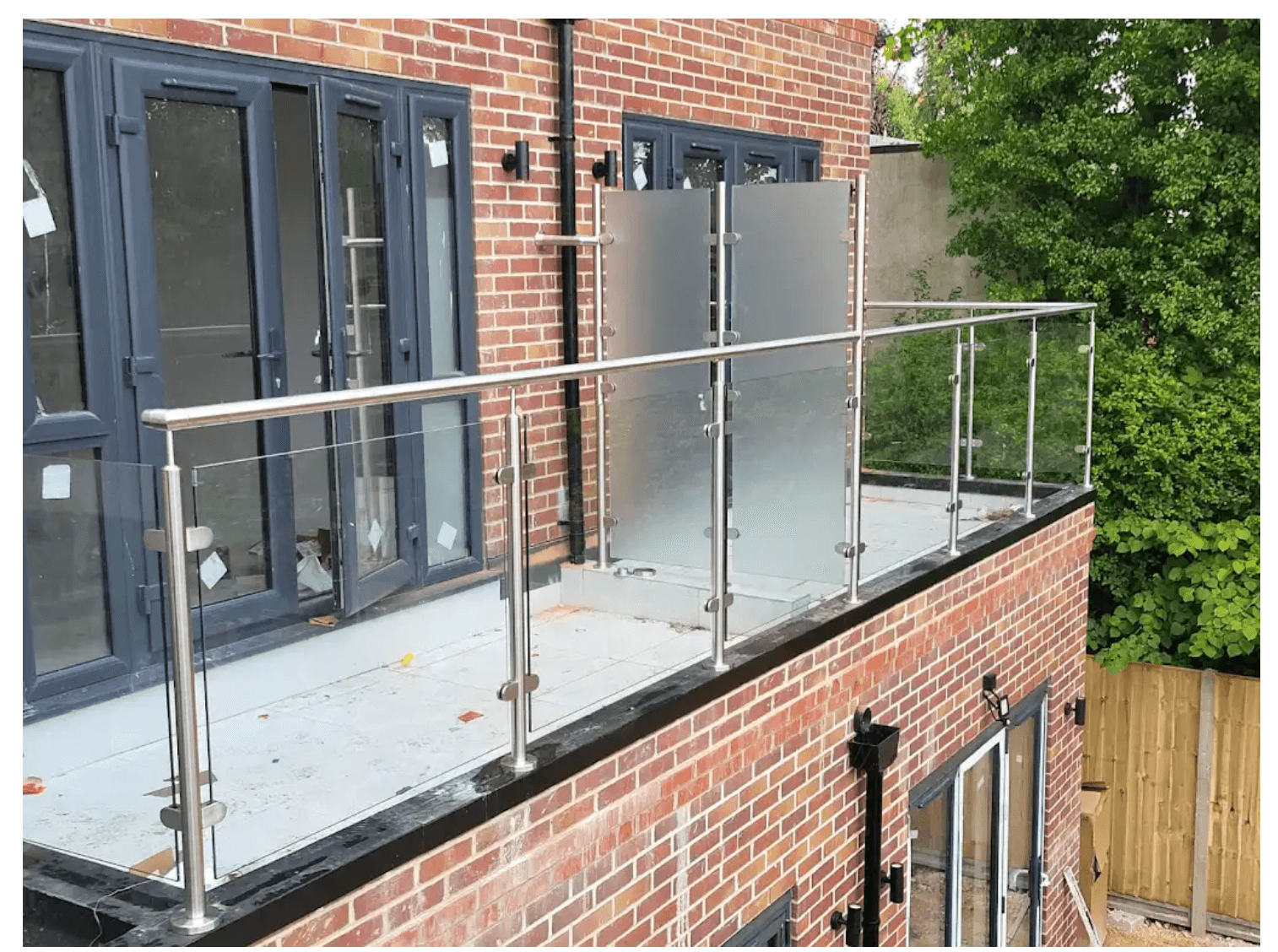 Stainless steel and glass balustrade system on terrace, Sutton Surrey