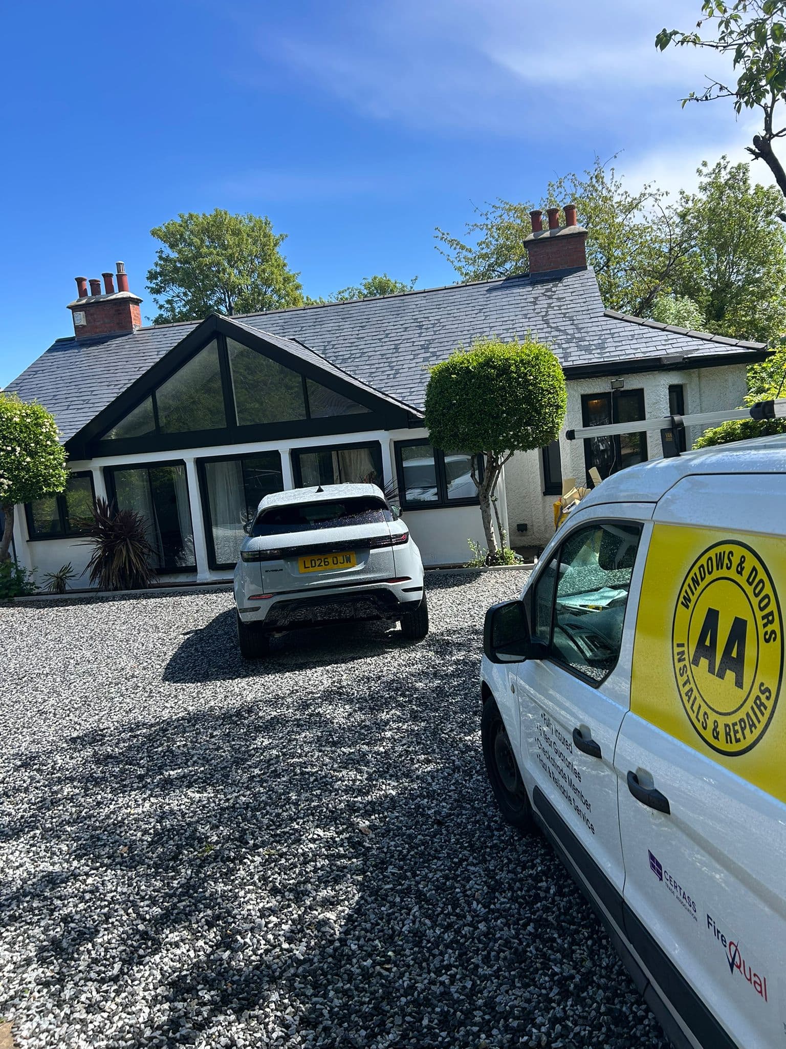 AA Windows & Doors van outside The Gallop, Sutton after completion